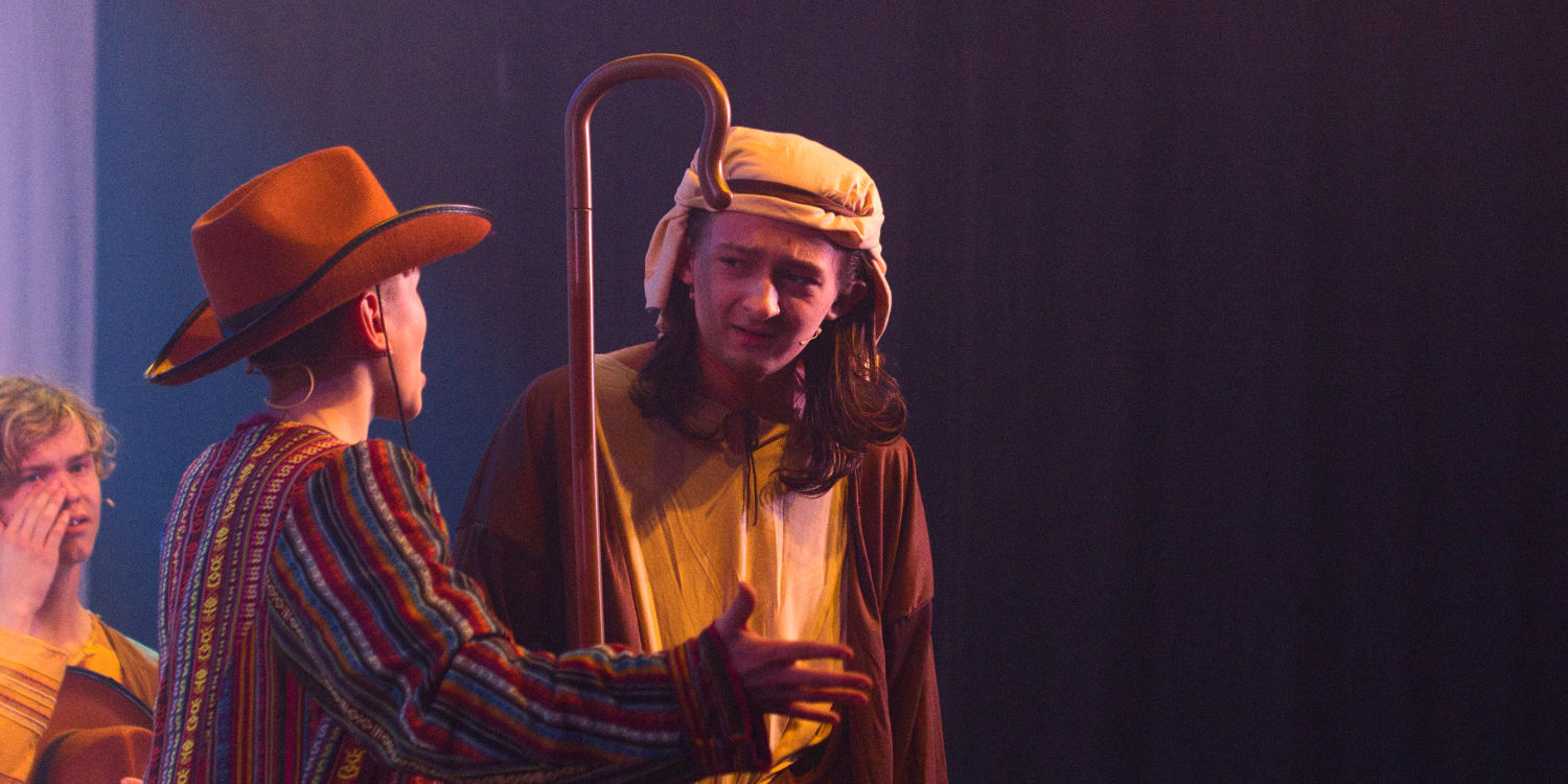 Brother and Jacob meet in a scene on stage in Joseph