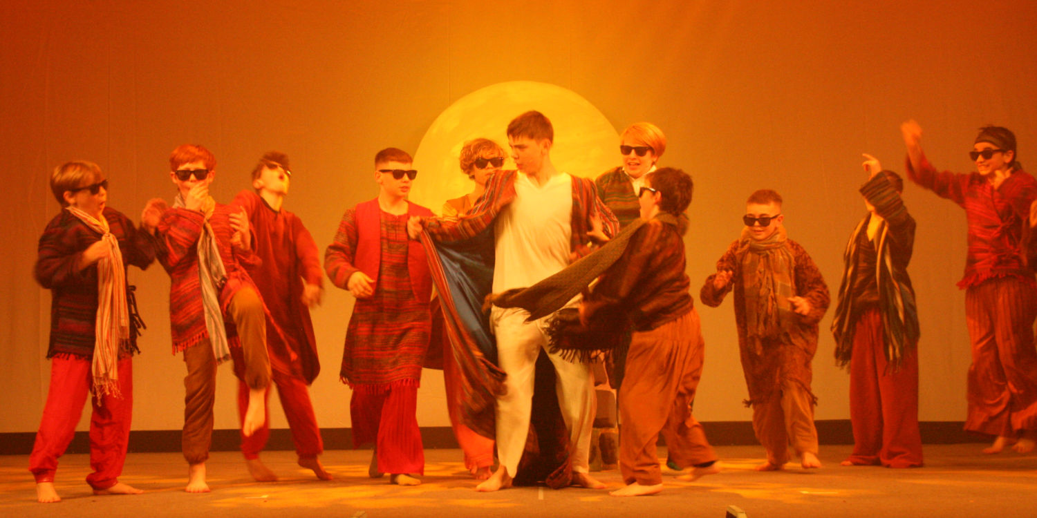 Students act in a scene from Joseph